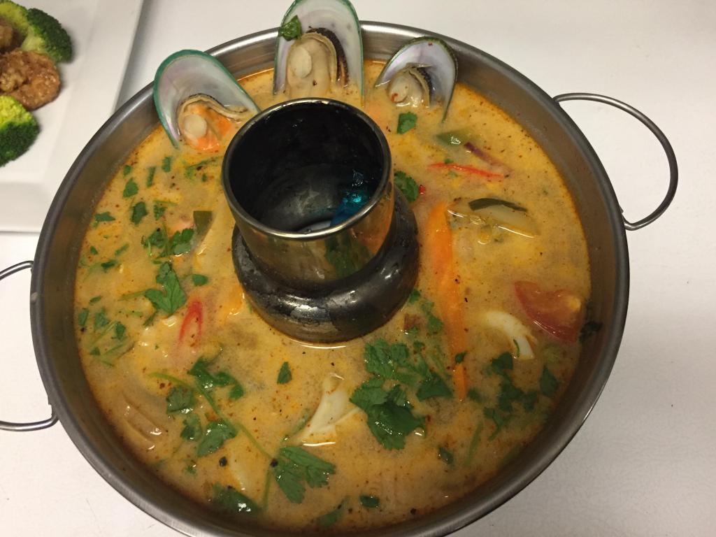 Tom Yum Soup · The famous and popular spicy and sour soup of Thailand! Mushroom, lime juice, imported lemon grass, Thai chilies, and Thai herbs. Spicy.