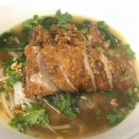 Duck Noodle Soup · Roasted duck with thin rice noodle, bok choy, bean sprout, and basil.