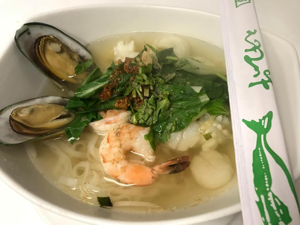 Seafood Noodle Soup · Mixed seafood including scallop, mussel, shrimp, squid, fish balls, bok choy, and bean sprout.