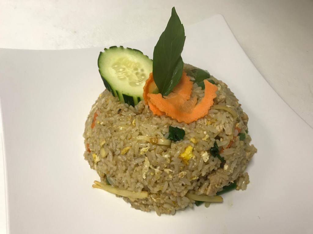 Spicy Fried Rice · Fresh chili, carrot, bamboo, onion, bell pepper, and fresh basil. Spicy. egg