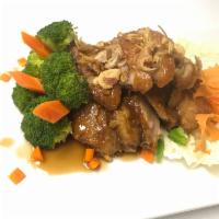 Duck Tamarind · Boneless crispy duck meat and tamarind Thai sauce.