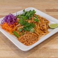Pad Thai · Sweet and tangy thin rice noodles, egg, bean sprout, green onion, and crushed peanuts with c...
