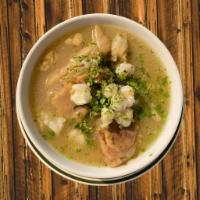Caldo de Pata · Cow feet soup, white hominy, chickpea, served w/ rice