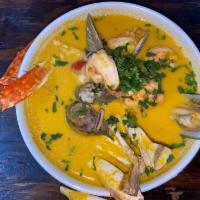 Sopa de Mariscos · Seafood soup with rice.