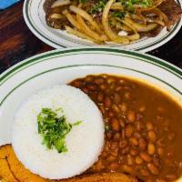 Bistec Encebollado · Steak sauteed with onions, sweet plantain, rice, and beans