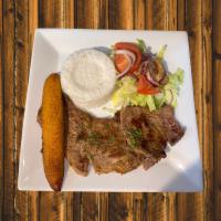 Carne Asada · Grilled beef with rice, beans, salad and fried plantain