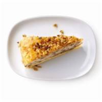 Baklava Cheesecake · Creamy cheesecake with layers of baklava, honey, and walnuts.