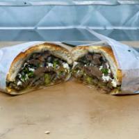 Torta · Toasted roll with choice of meat, cheese, cilantro, and onion.
