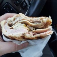 Cuban Panini · Roast pork loin, ham, pickles, and Swiss cheese and honey mustard.