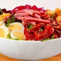 Cobb Salad · Honey Baked ham, bacon, cheddar cheese, roasted tomatoes, pickled red onions, hard-boiled eg...