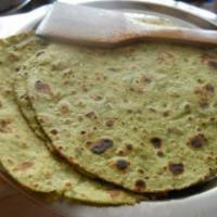 Spinach Paratha · Fresh spinach blended with whole wheat flour double folded bread.
