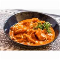 Chicken Tikka Masala  · Boneless pieces of chicken marinated and cooked in a clay oven.
