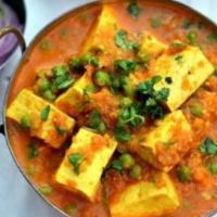Mattar Paneer · Homemade cheese and peas cooked with tomatoes, herbs and spices. Served with saffron basmati...