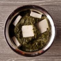 Palak Paneer · Spinach with paneer, fresh herbs and spices. Served with saffron basmati rice pilaf.