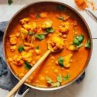 Curries Entrée · Fresh blend of onions, tomatoes, ginger, garlic and fresh herbs simmered on the flame. Serve...