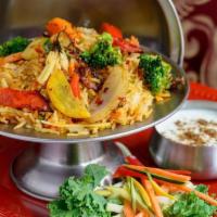 Mixed Vegetable Biryani · Basmati rice with mixed vegetables and spices. Vegetarian.