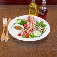 Chef Salad · Ham, salami, provolone over garden salad.