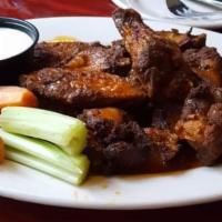 Buffalo Wings · Choice of mild, medium, hot, BBQ or apple jameson. Served with a side of celery, carrot stic...