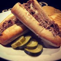 Hot Roast Beef Sandwich · Dipped in au jus and served on a round roll. 