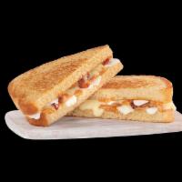 Smoky Mozza Grilled Cheese · Fresh mozzarella, white American cheese, bacon, and smoked tomato spread on toasted sourdoug...