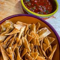 Chips con Salsa · lightly fried corn tortillas cut in quarters served with salsa.