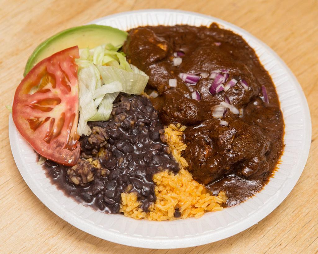 Mole Poblano Plato · Served with rice and beans or salad and tortillas.