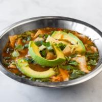Tortilla Soup · With diced chicken and pinto beans topped with shredded cheese, avocado, tortilla strips, an...