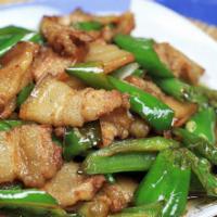 Farmhouse Fried Pork with Rice辣椒炒肉盖饭 · Cooked in oil.