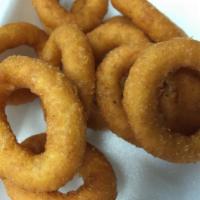 A11. Onion Rings · 10 pieces. Fried battered onion.