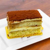 Tiramisu · Delicate genoise sponge cake soaked in espresso in between layers of decadent mascarpone sab...