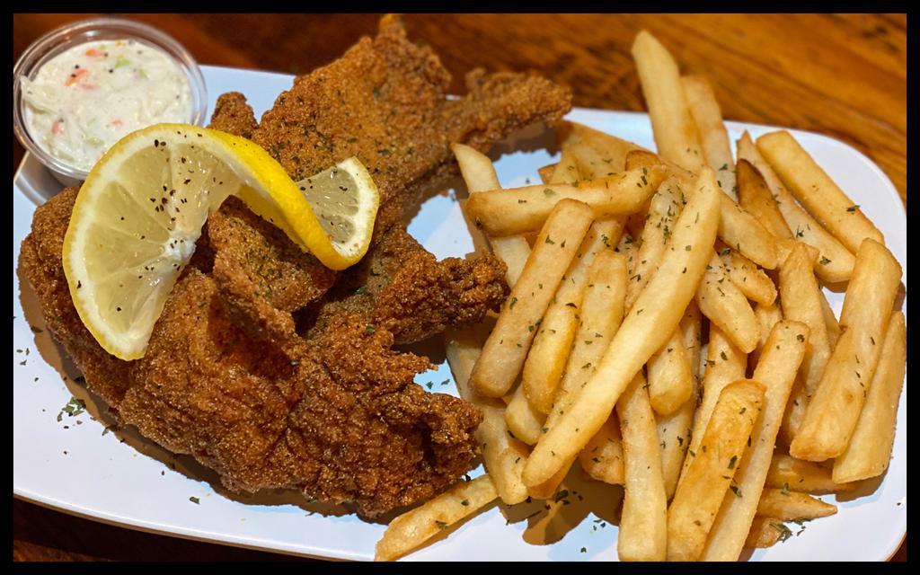 Catfish Fillet · Seasoned in your choice of Mild or Cajun Batter Fillets, served with side of Fries, Coleslaw, and Bread. Served with Ketchup, Tarter Sauce, Buffalo Sauce