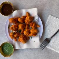 Mixed Pakora · Assorted fried vegetable fritters (cauliflower, onion, potato, and spinach).