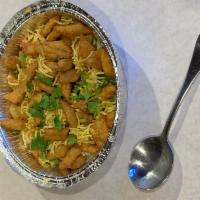 Chat Papri · Mixture of crisps, potatoes, and chickpeas in a yogurt and tamarind sauce.