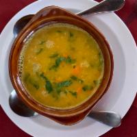 Mulligatawany Soup · Traditional soup made with yellow lentils and flavored with delicate herbs.
