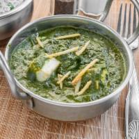 Palak Paneer · Cottage cheese cubes cooked in creamy gravy of spinach and spices.