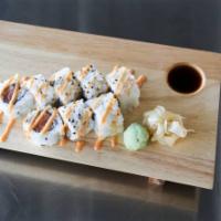Spicy Salmon Roll · Mild spicy salmon roll 8pcs spicy mayo on top (Raw)