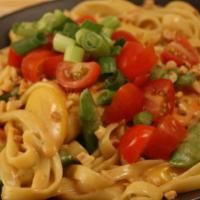 5. Thai Peanut Fettuccini · Authentic Thai spices, including a special curry, blended to creamy perfection. Topped with ...