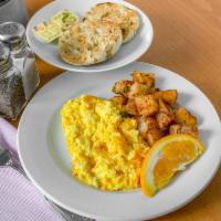 Hole 5 · 2 eggs scrambled with cheddar cheese served with home fries and a toasted English muffin.