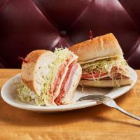 Mulberry Street Hero · Genoa salami, pepperoni, ham, capicola, provolone cheese, lettuce, and tomatoes, topped with...