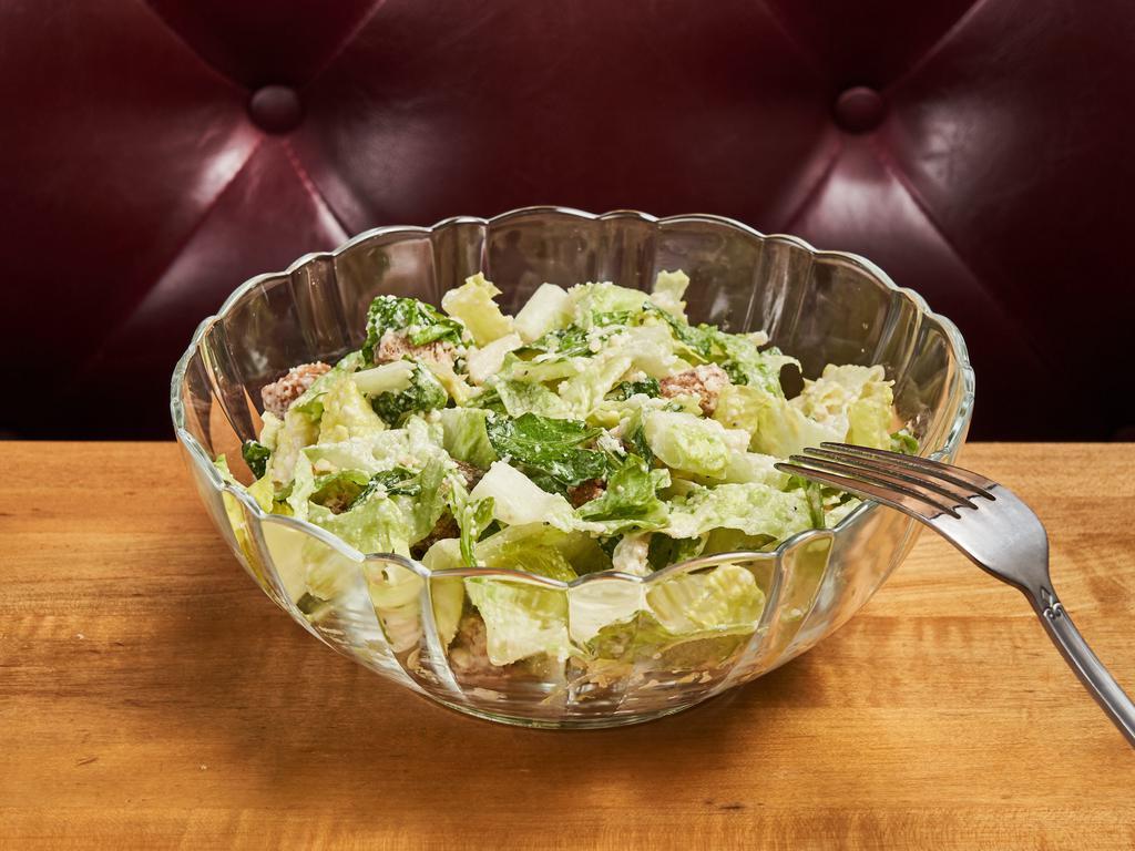 Caesar Salad · Romaine lettuce with homemade croutons, grated Parmesan cheese, and creamy Caesar dressing.