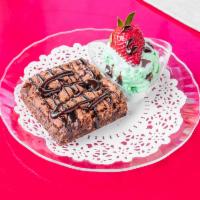 Hot Fudge Brownie with Ice Cream · Delicious homemade brownie with hot fudge and 1 scoop of your choice of ice cream.