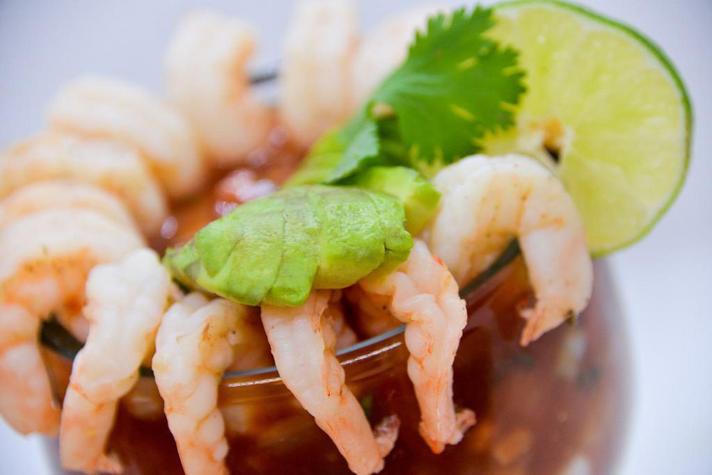 Shrimp Cocktail · Boiled shrimp with avocado, lime juice, tomatoes, onions, jalapeno peppers, cilantro and homemade red sauce. Served hot or cold.