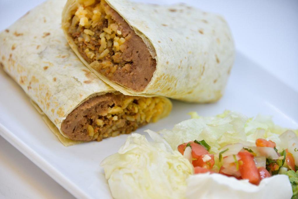 Anaconda Burrito · Make your own anaconda burrito filled with rice and beans and your choice of fillings. Served with mexi-salad.