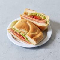 1. Italian Combo Sandwich · pepperoni, salami, ham, provolone, lettuce, tomatoes, sweet peppers and oil and vinegar.