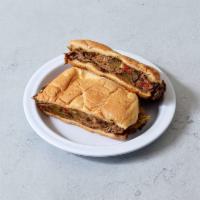 4. Home Roast Sandwich · Grilled roast beef, melted American cheese, grilled peppers and onions.