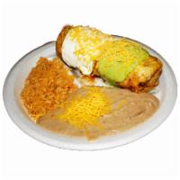 Chimichanga Combo Plate · Chimichanga (any meat) topped with sour cream, guac and shredded cheese. Served with rice an...