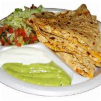 Grilled Chicken Quesadilla · Flour tortilla, cheddar cheese and grilled chicken. Served with sour cream, guac, lettuce an...