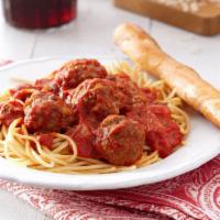 Spaghetti with Meatballs · Includes salad and garlic knots.