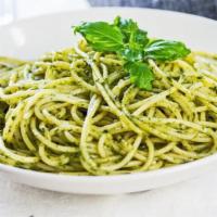 Spaghetti Pesto · Includes salad and garlic knots.