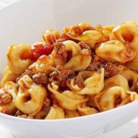 Tortellini meat · Served with a cheese and meat filling. Includes salad and garlic knots.